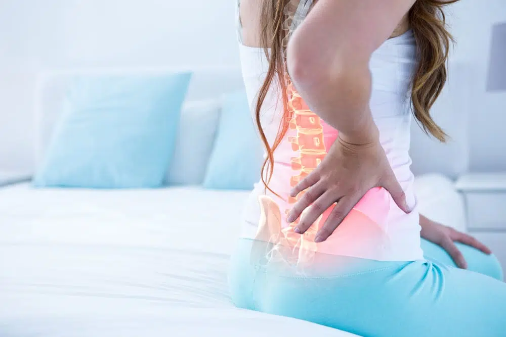 A woman's back hurting