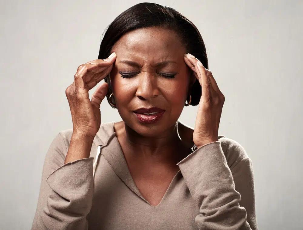 Woman suffering from headache and migraine