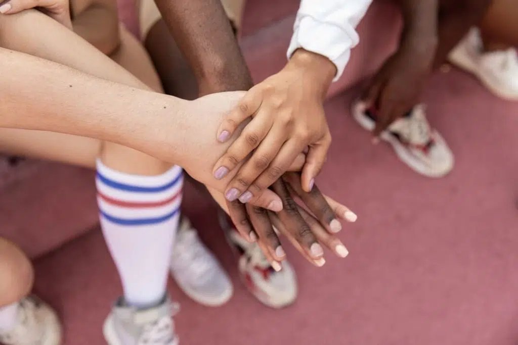 athletes hand together