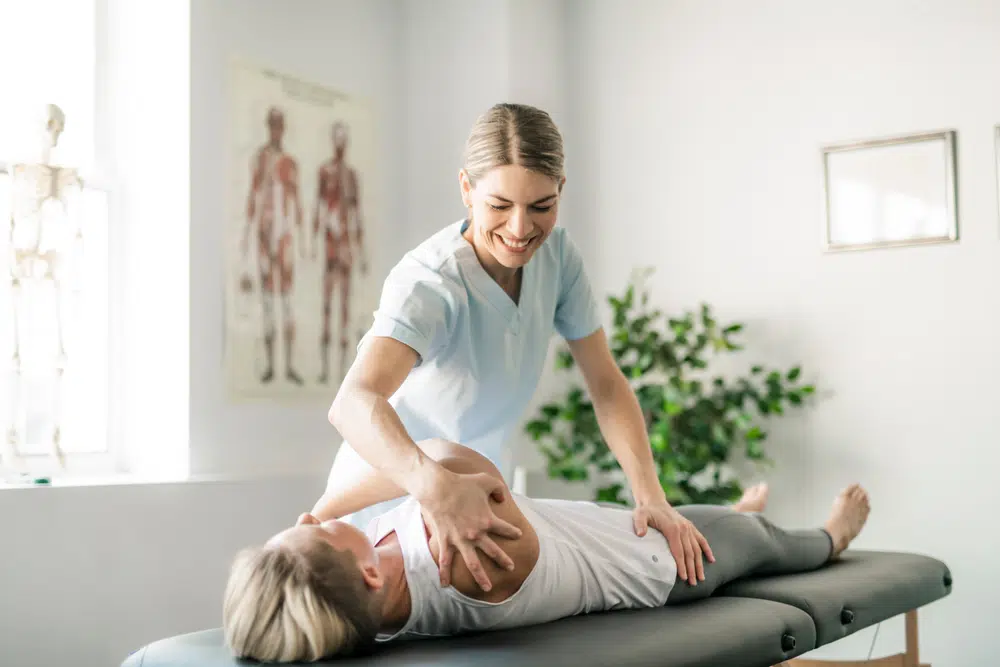 Personalized chiropractic care in aurora administered by therapist to a female patient